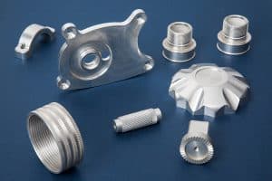 a collection of aluminum component parts